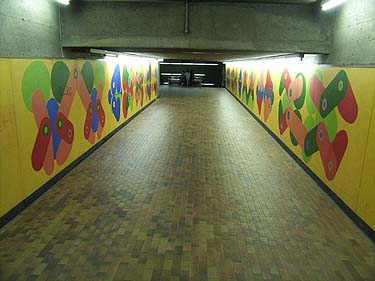 Murals by Guy Montpetit in a corridor