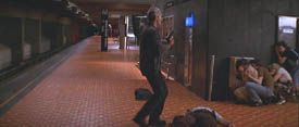 Declan Mulqueen (Richard Gere) cases the station in The Jackal