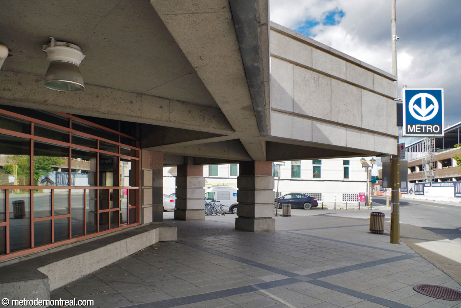 Looking east from under the roof overhang of the Beaumont headhouse, which repeats the deep ceiling coffers of the station interior.