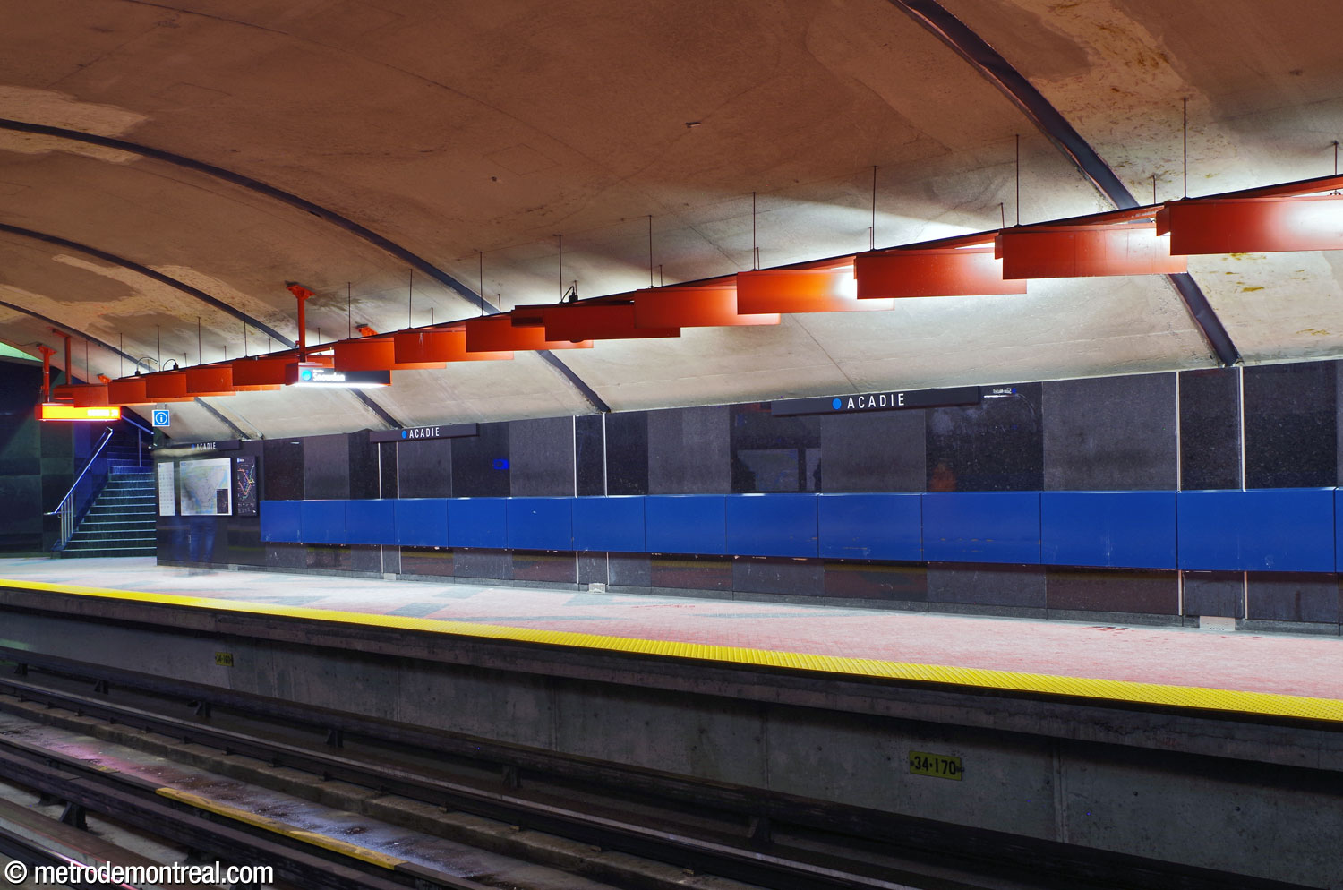 The light fixtures on the Snowdon platform showing the unique gradient effect produced by their diagonal placement and the light reflected by their shades onto adjacent fixtures.