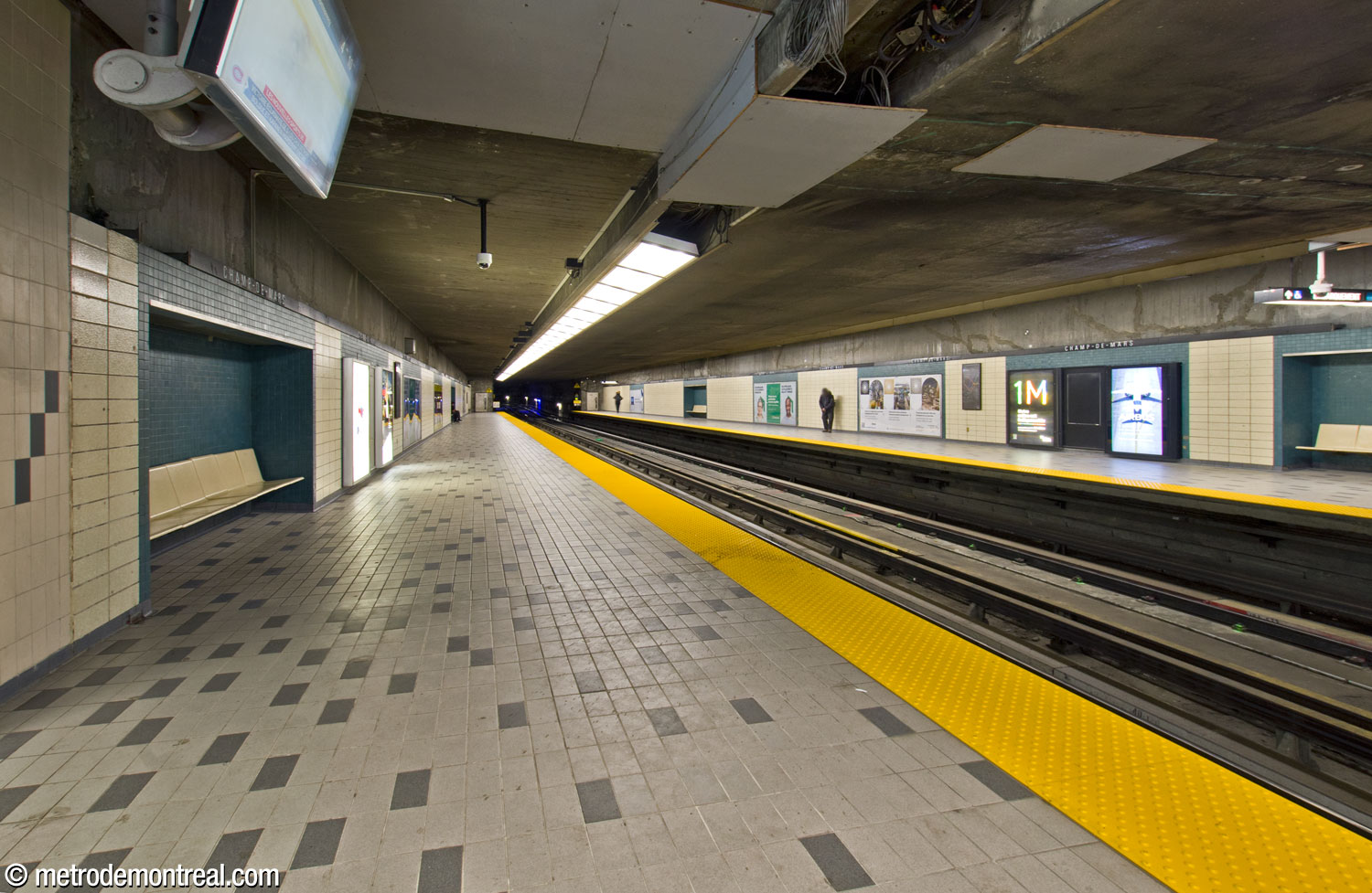The eastern end of the trainroom, showing the cream and blue-green tiling on the station’s walls and floor.