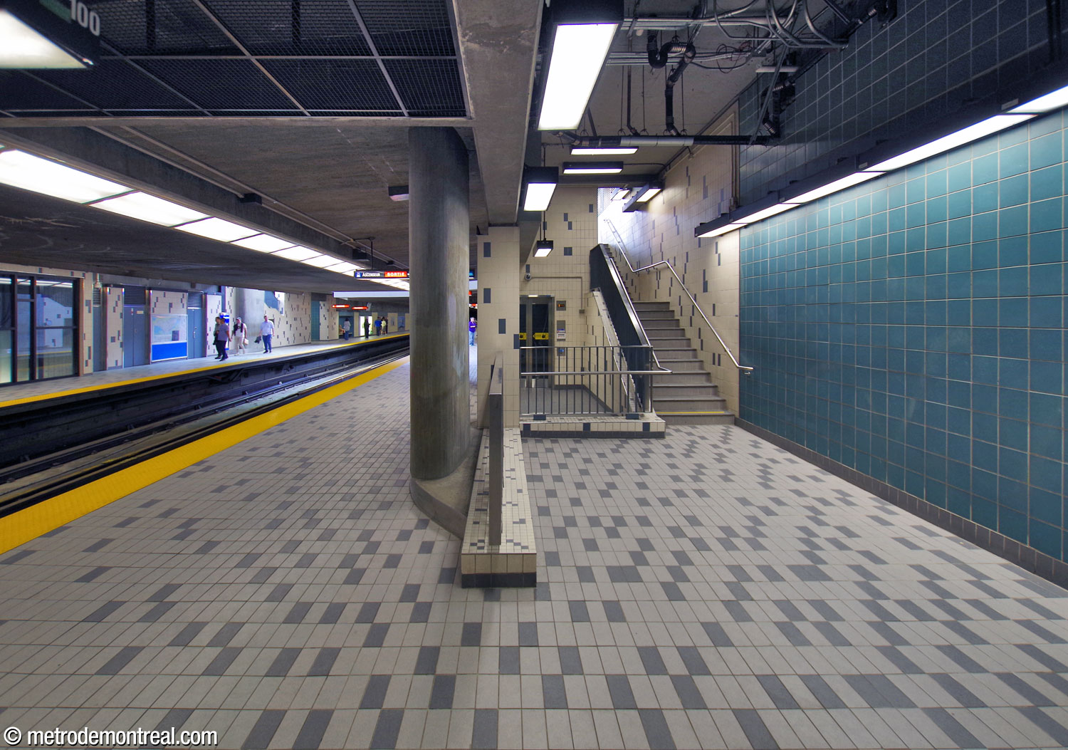The foot of the elevator and eastern stairwell down to the Côte-Vertu platform. For some reason, while both eastern stairwells, were narrowed to receive the elevator shafts, the one on this platform is about one-third narrower than its counterpart.
