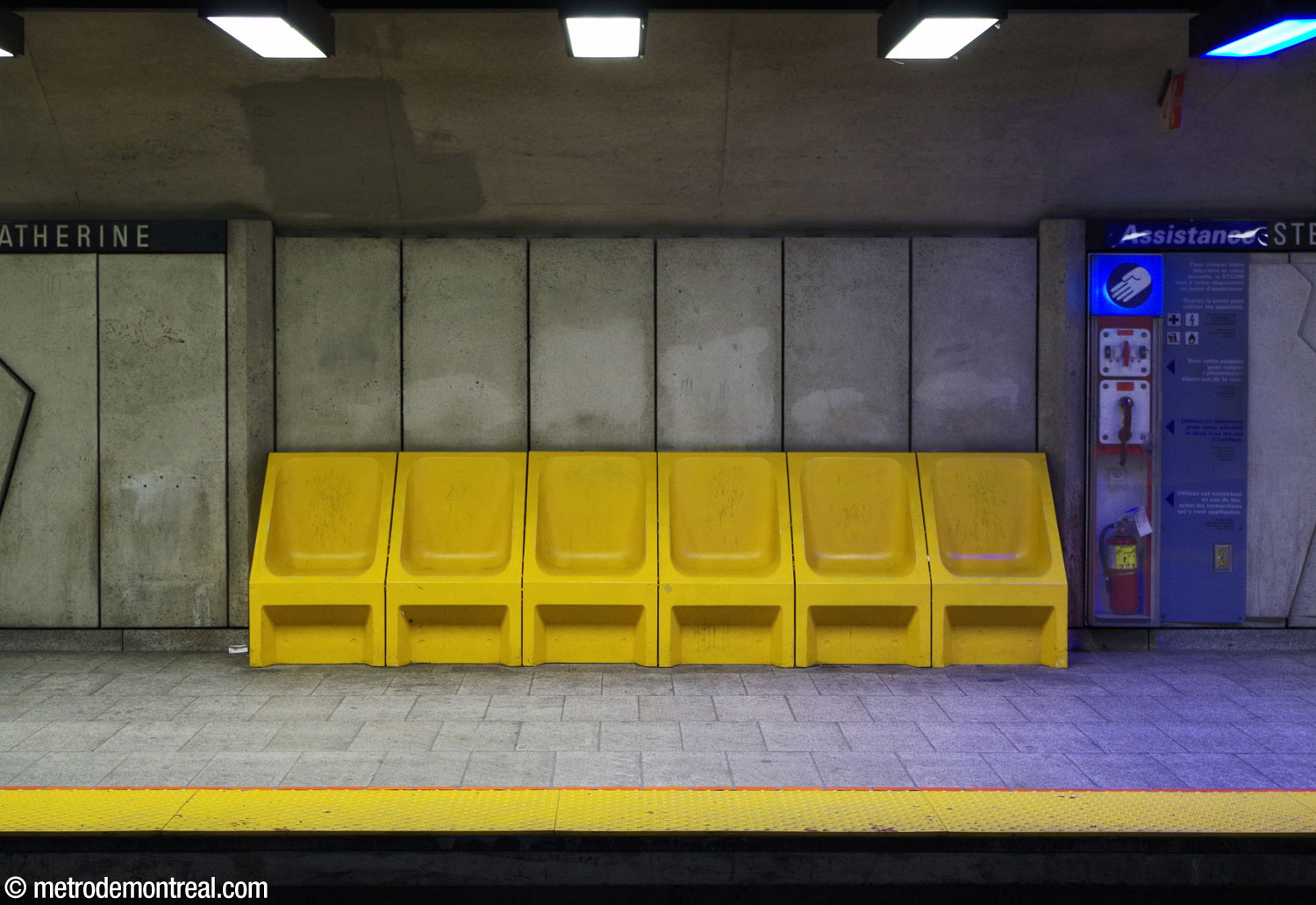 A row of the station's yellow bucket seats.