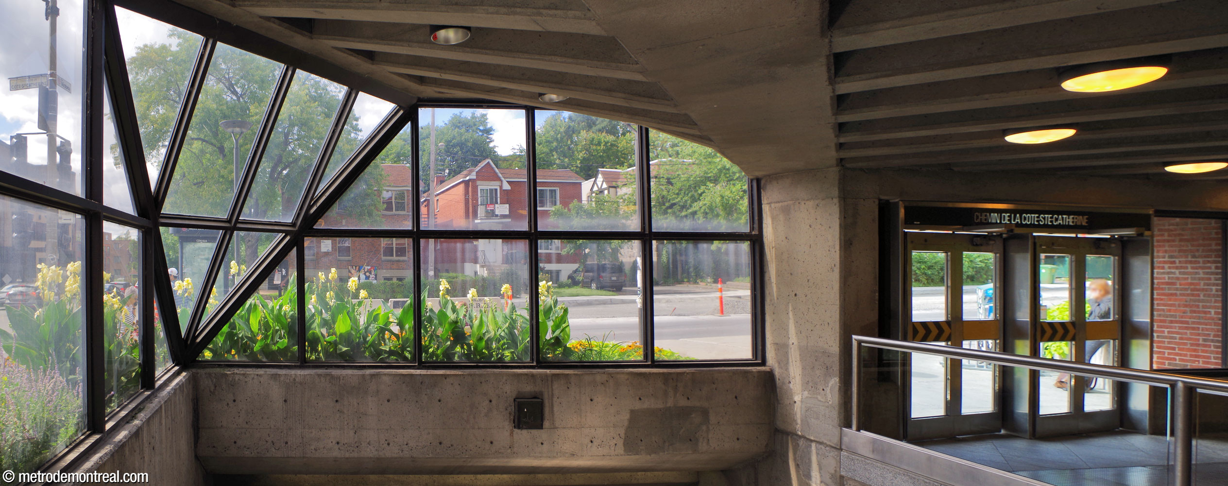 The window over the stairwell in the headhouse. The corner of the building is chamfered, forming a striking triangular surface.