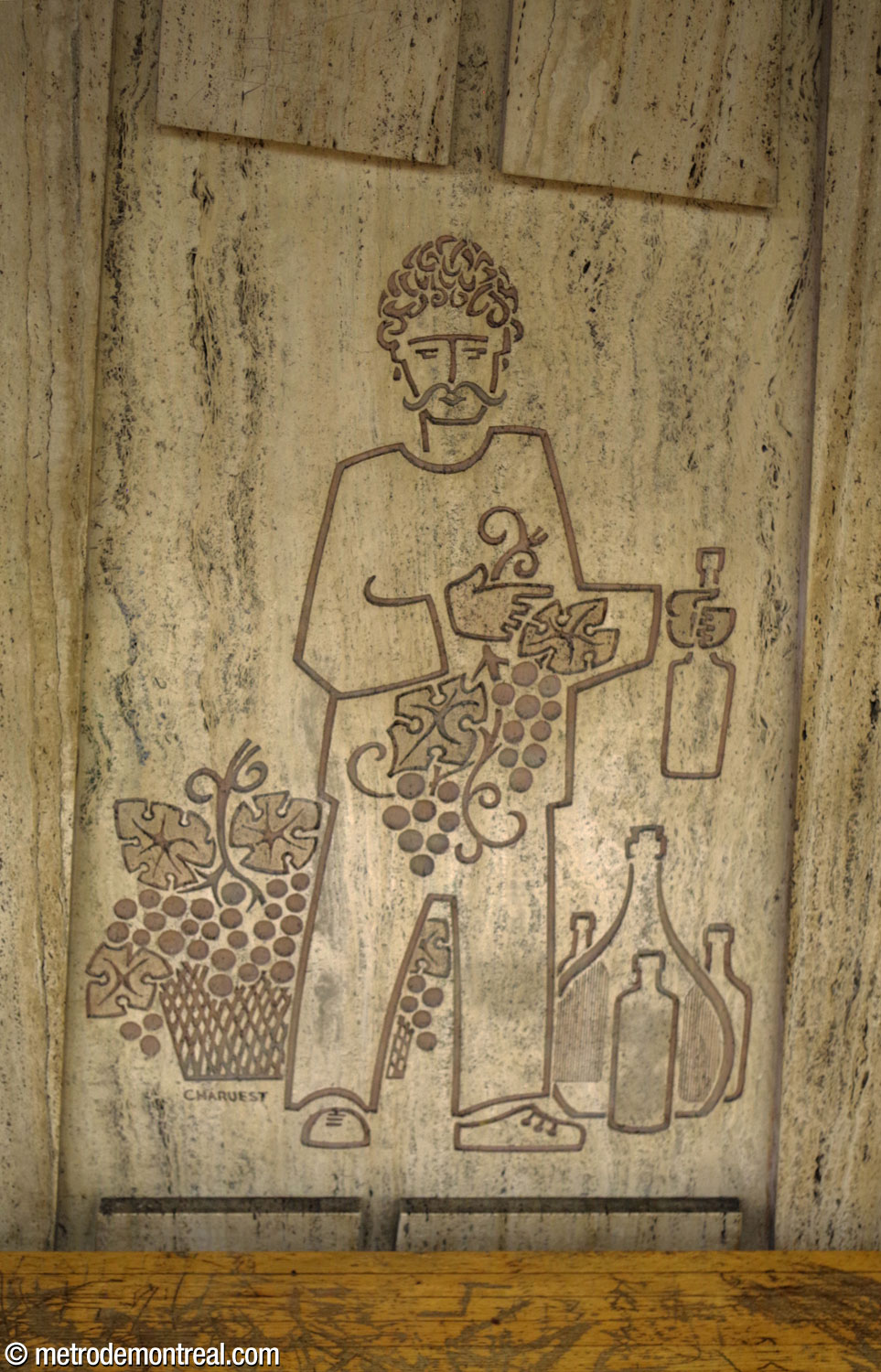 A bas-relief by Jean-Charles Charuest on one of the station's platforms, depicting a wine seller.