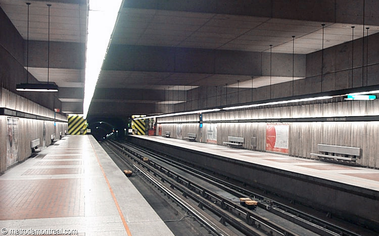 The platform end walls were formerly painted with striking diagonal black and yellow stripes, like a road safety sign.