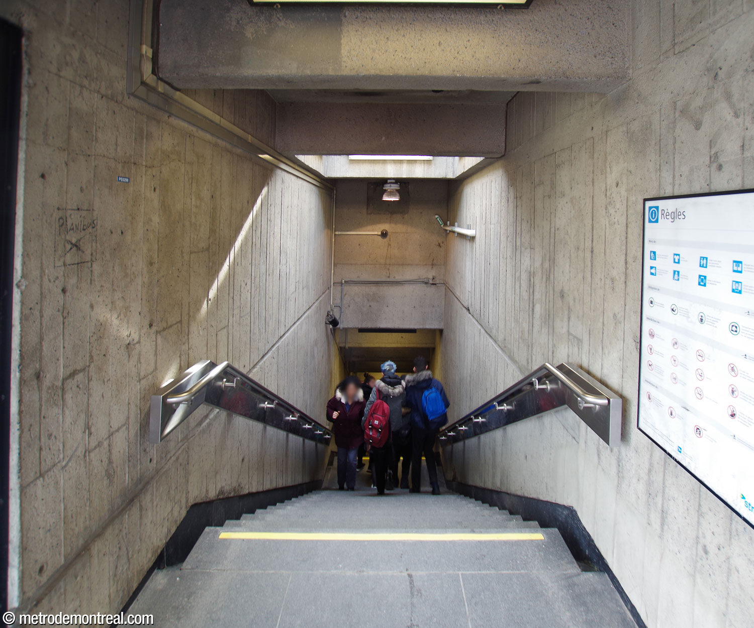The narrow Sherbrooke Nord entrance is little more than a covered stairwell leading into the station.