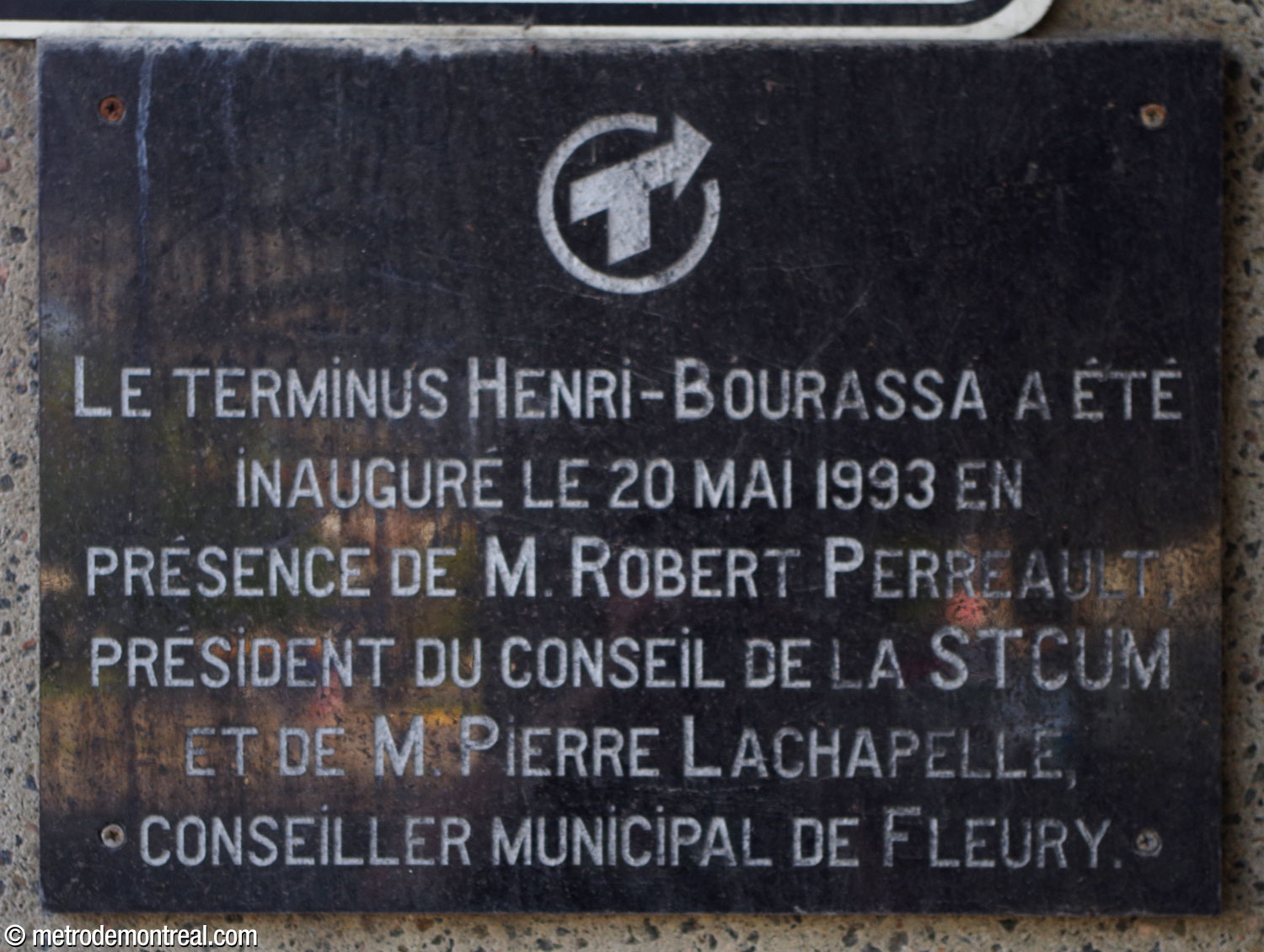 Commemorative plaque located on the north building of the bus terminal