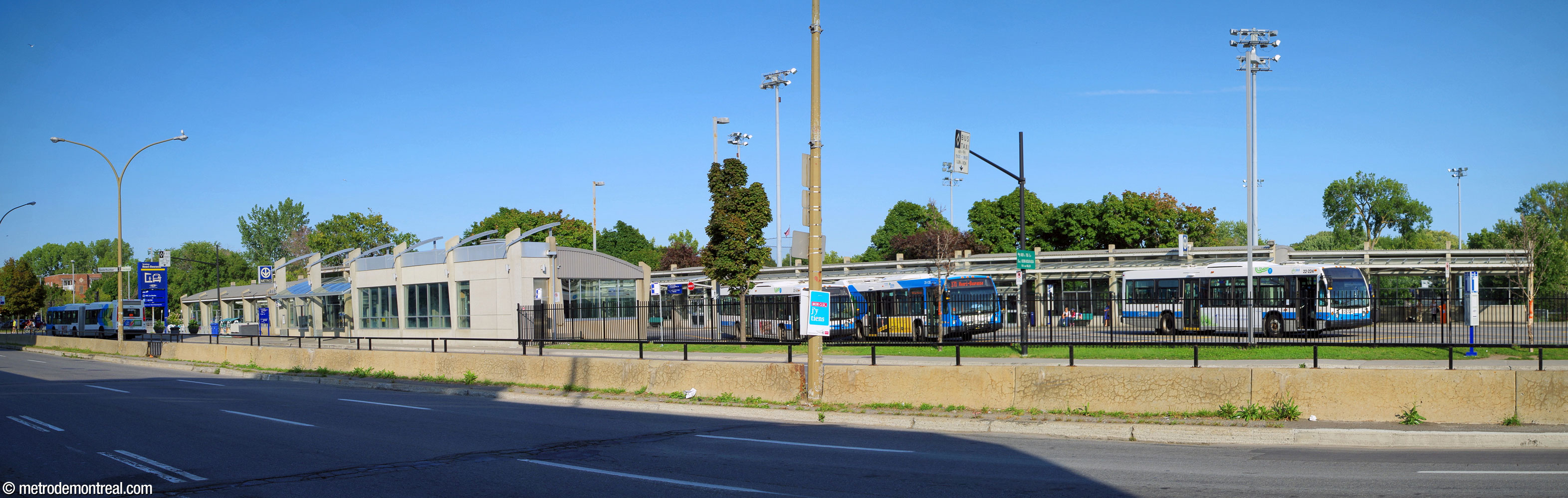 Overview of the Henri-Bourassa Sud bus terminal, seen from Boulevard Henri-Bourassa. The north terminal building is at left, the south one at right.